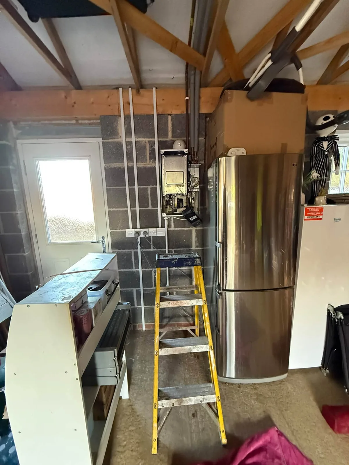 Leaking old boiler removed during a boiler breakdown in Northampton