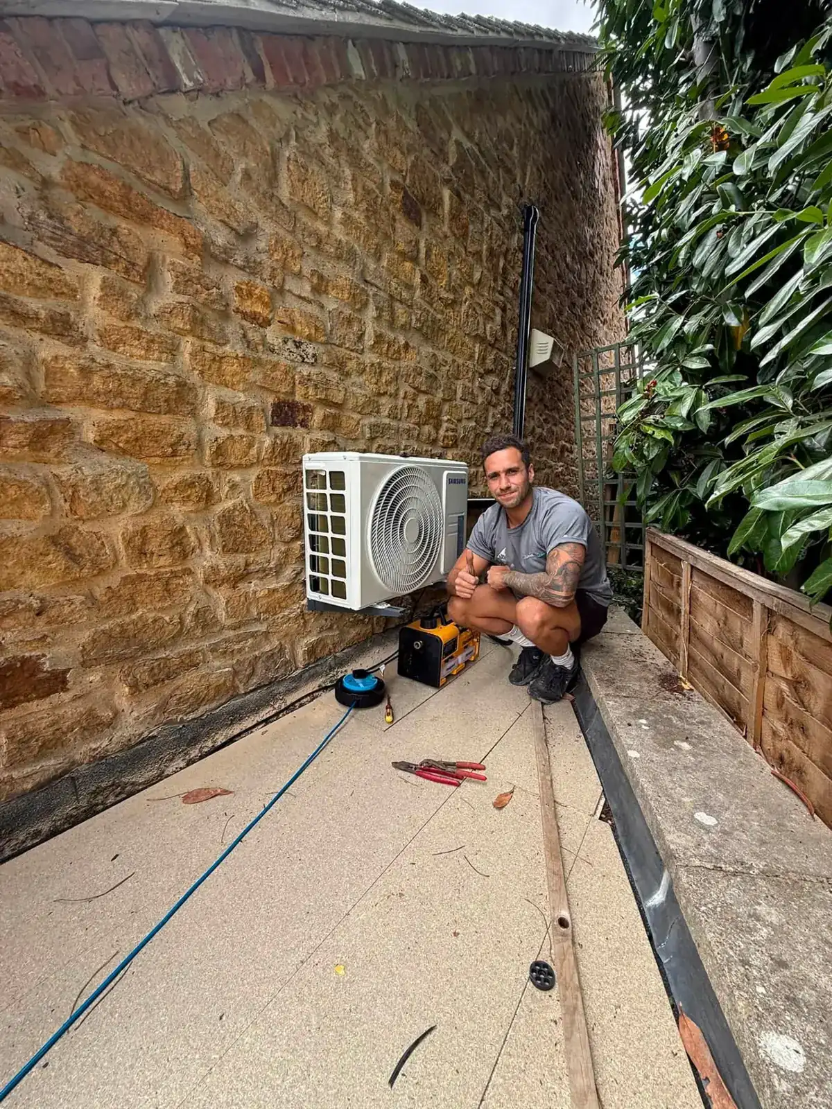 Jordan Lamb, local boiler and air con engineer in Northampton, with an air con install